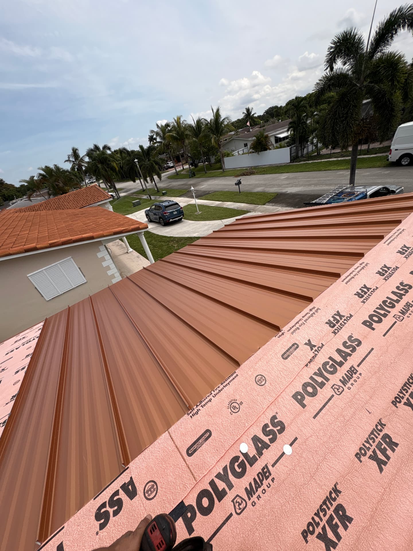 New standing seam metal roof installed on a South Florida home